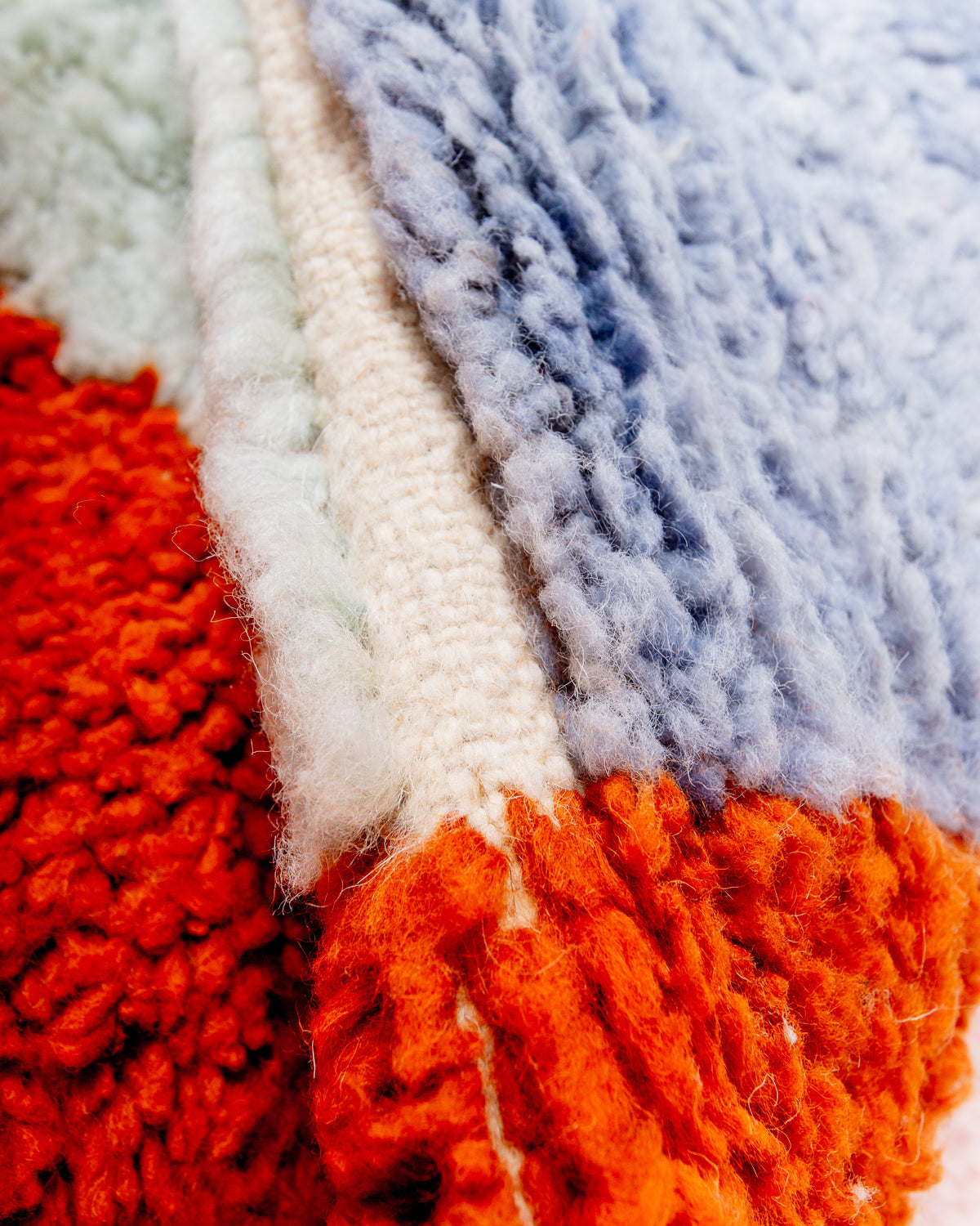 Modern, designer, handcrafted Berber rug from Morocco. Beniourain carpet with beautiful colours and patterns and fluffy wool texture.